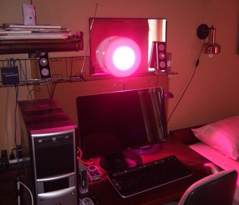 The UFO Grow Light that I used for LED Light Therapy Skin Facials, mounted behind my computer monitor