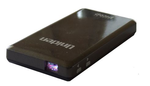 Laser Pico Projector - elevated view from right-hand front showing glass window that the laser light emerges from, and two OSD menu navigation buttons on right-edge